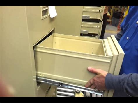 how do you strip the steel on filing cabinet|remove file drawer youtube.